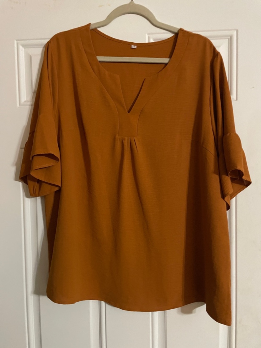 Relaxed Rust Split-Neck Blouse with Ruffle Sleeves